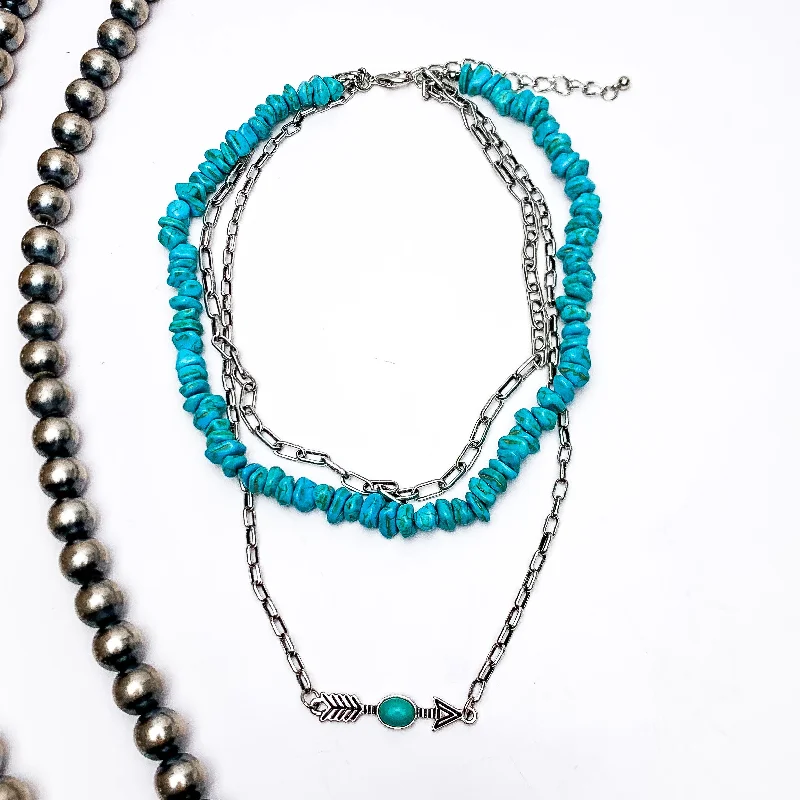 boho necklaces for women-Triple Strand Silver Tone and Turquoise Necklace With an Arrow Charm