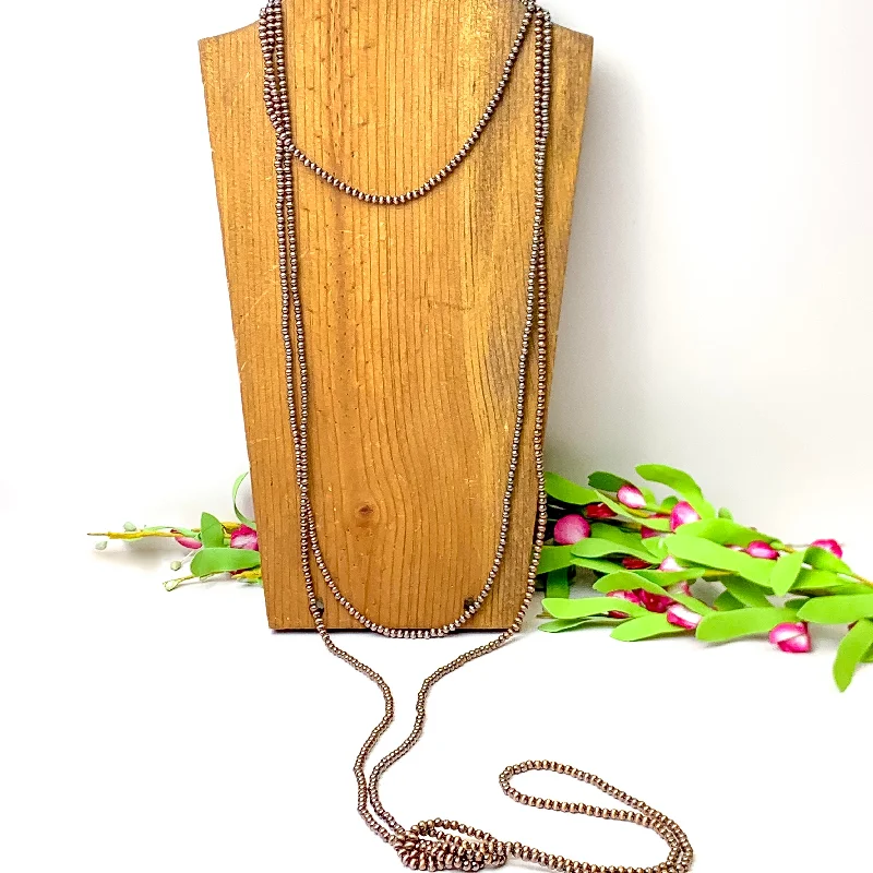 trendy necklaces for women-Extra Long Three Row Faux Navajo Pearl Layering Necklace in Copper Tone