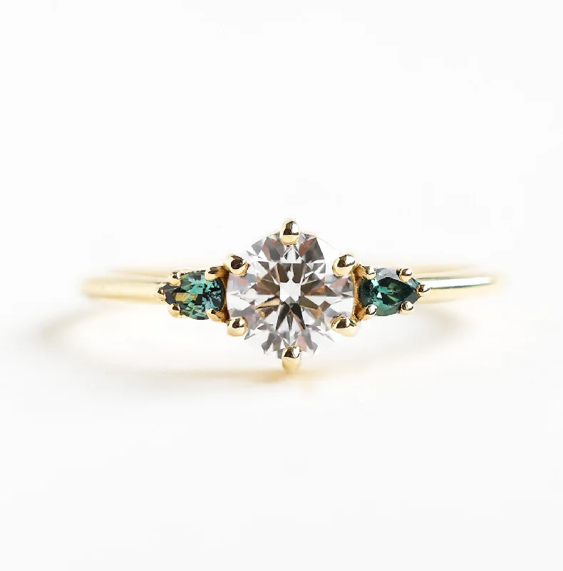 vintage-inspired engagement rings for women-Round Three Stone Diamond Ring With Teal Pear Sapphires