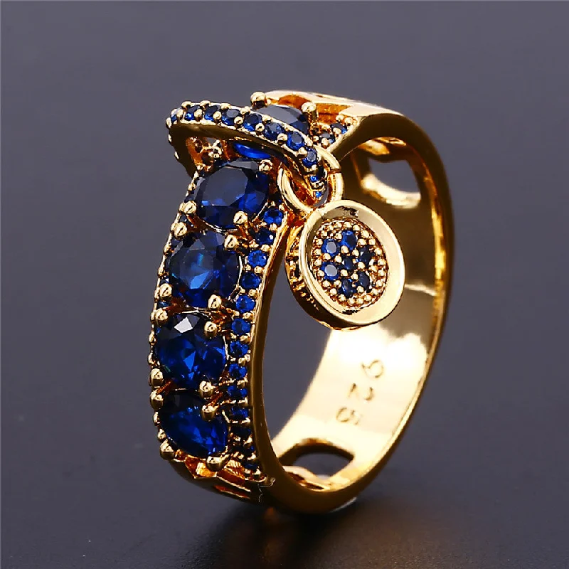 Gold Disc Sapphire Blue Zircon Ring