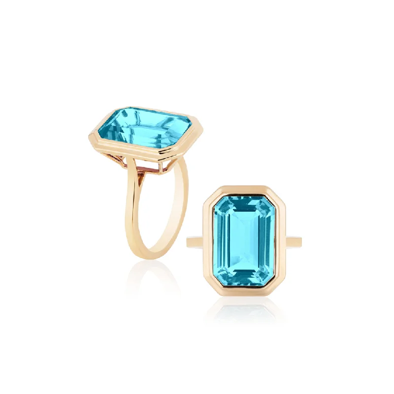 birthstone rings for women-Goshwara Manhattan Blue Topaz Emerald Cut Ring JR0206-BT-Y